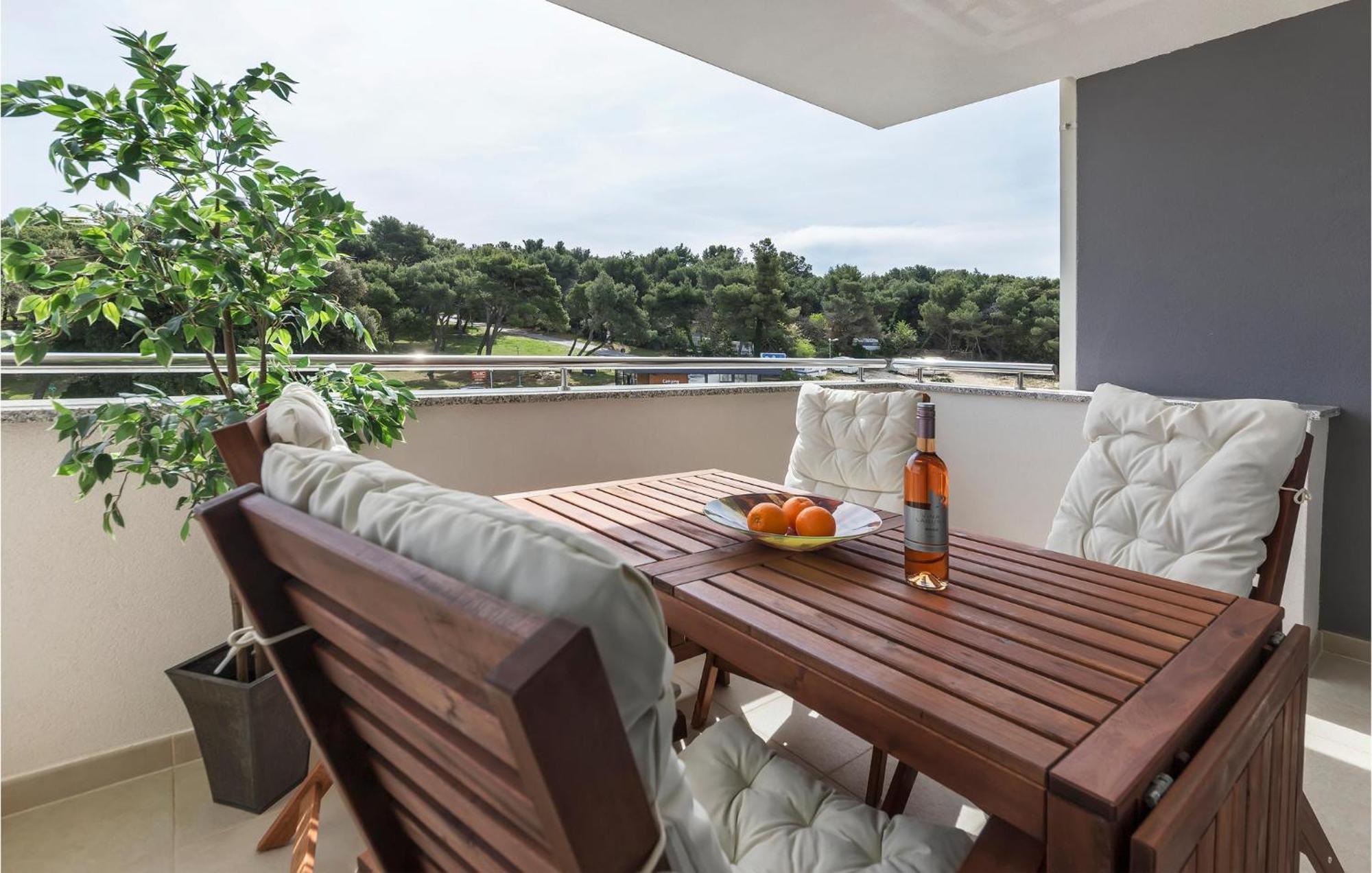 Amazing Apartment In Premantura With Kitchen Exterior photo