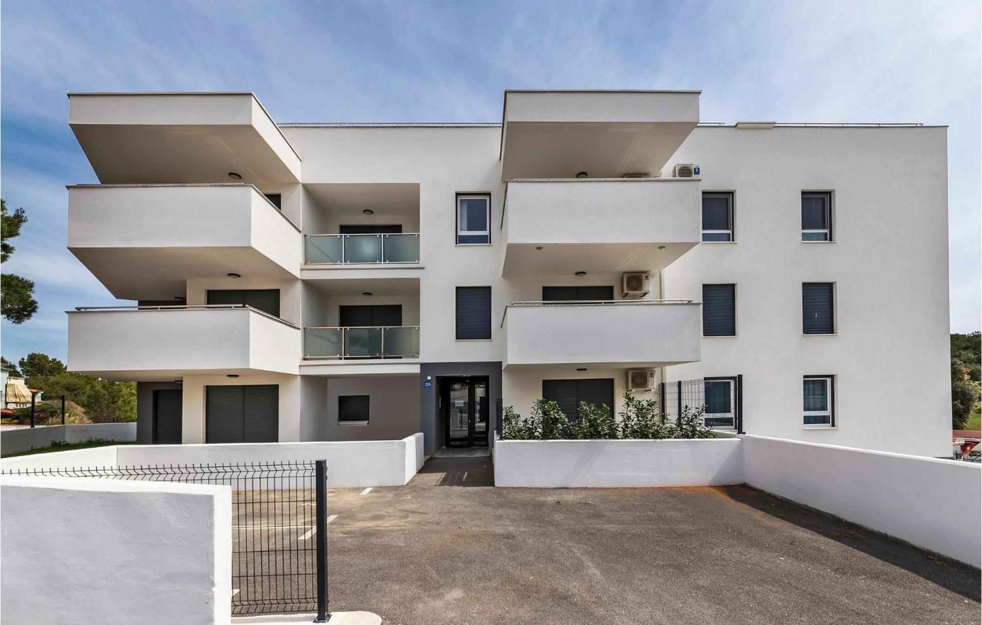 Amazing Apartment In Premantura With Kitchen Exterior photo